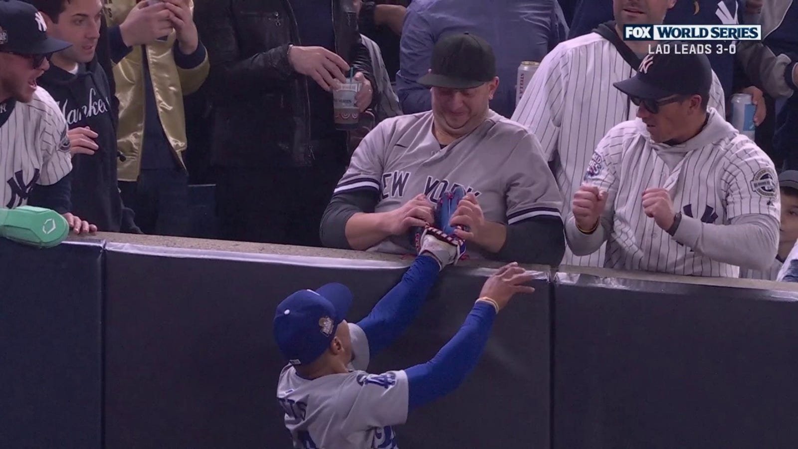 Yankees fan pulls ball out of Mookie Betts' glove in World Series Game 4